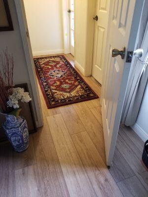 We love how this floor looks with Persian-style rugs.