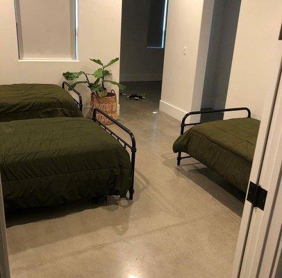 Polished concrete floor in bedroom