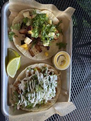 Pork belly taco special on the left and pork barbacoa on the right