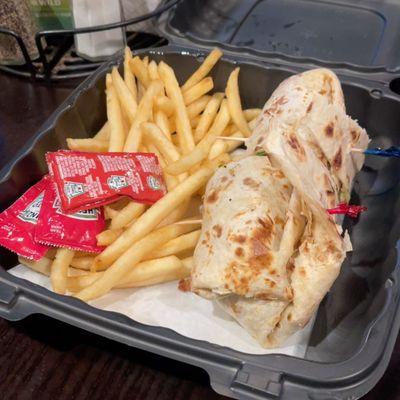 Caesar chicken wrap and fries