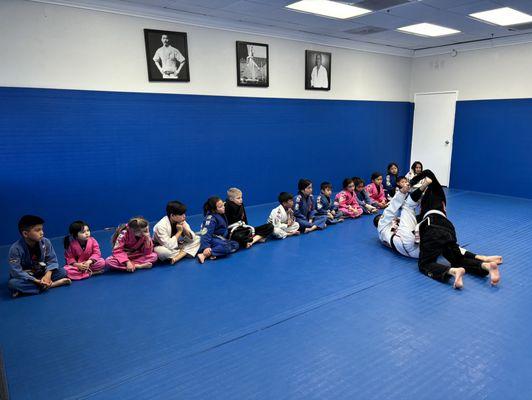 Professor James teaching the kids class