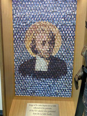 Patron saint de la Salle, with photos of every graduating student since their inception