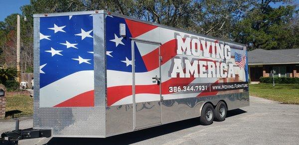 One of our 26' Cargo Trailers. Customized for residential neighborhoods with low hanging trees, and faster loading and unloading.