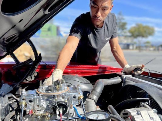 Re Jetting and tuning the carb on this Classic Camaro.

 We work on Classics as well as Supercars, and everything in between!