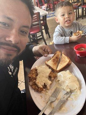 Dad and son eating good food