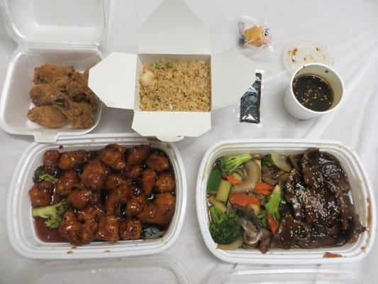 Teriyaki grilled steak with mixed vegetables ($13.99) and six General Tso's chicken wings ($6.49)