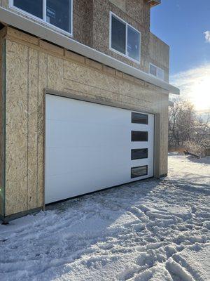 Garage door 16ft by 8ft with windows