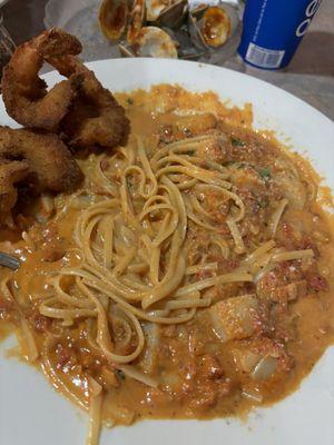 Linguini with scallops and fried shrimp in brandy cream sauce. So good!!!