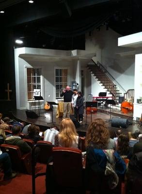 Ethos worship service prayer. As you can tell, Ethos meets in the main stage of the Biograph Theater.