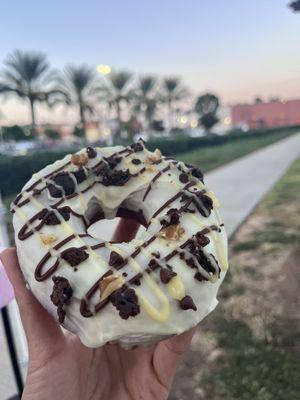 Chunky Monkey Donut. Banana Milk glaze with brownie chunks, walnuts, chocolate ganache and banana drizzle