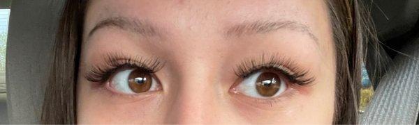 Initial lash job: uneven thickness, and gap apparent on left eye.