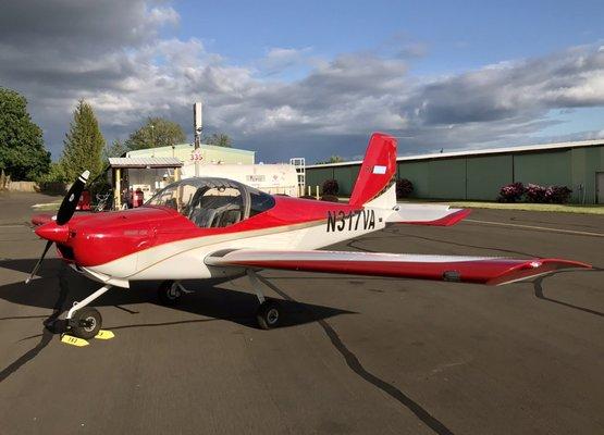 Van's RV-12is at 7S3. (Sign in the background indicating the $ of av-gas very likely the lowest price out of any other local airports).