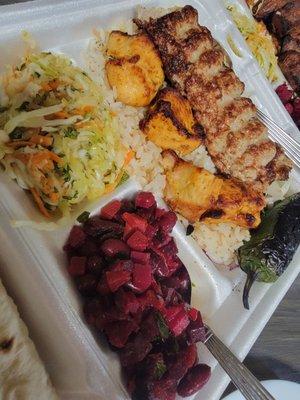 Chicken plate..over rice. Came with beet salad & lemony cabbage salad