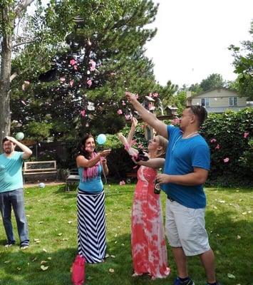 The perfect gender reveal balloon pop! Pink rained down EVERYWHERE! Fun Services went above and beyond to make this day PERFECT!