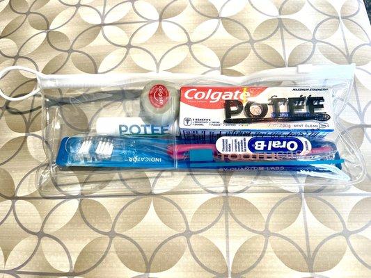 Courtesy cleaning kit. ( Toothpaste, tooth brush, chap stick & floss). 11/22/21.