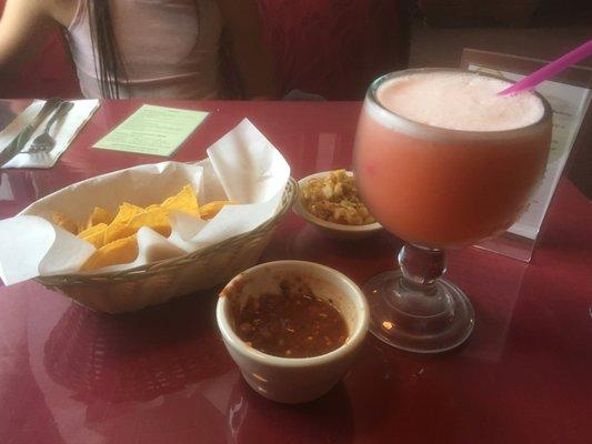 Large margarita with chips and salsa