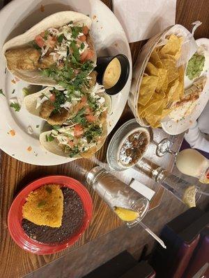 Tacos De Pescado Baja Style with yellow rice and refried beans