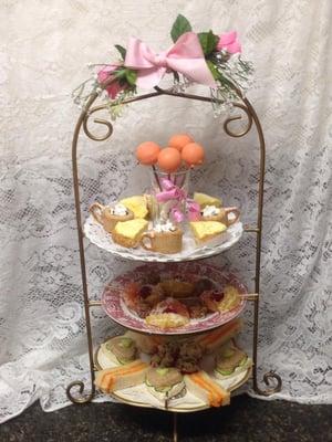 Everyone attending get a beautiful three tier plates: tea sandwiches, fresh fruit, and amazing desserts... All fresh, every tea.