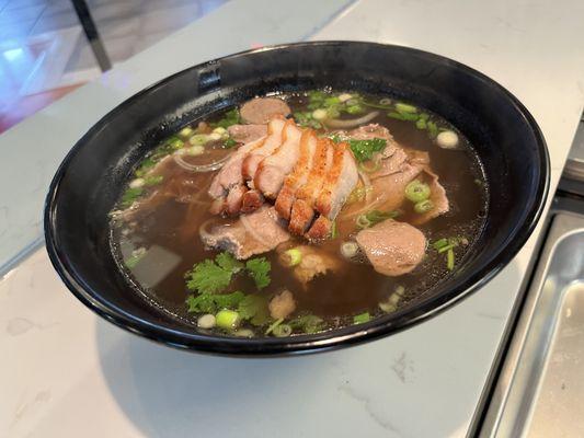 Build Your Own Pho - topped with crispy pork belly