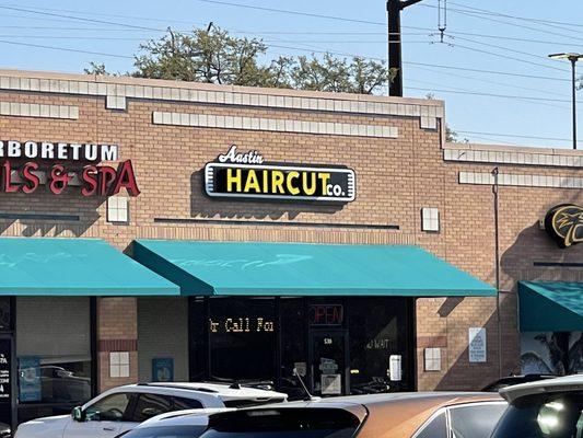 New store sign Austin Haircut Co.