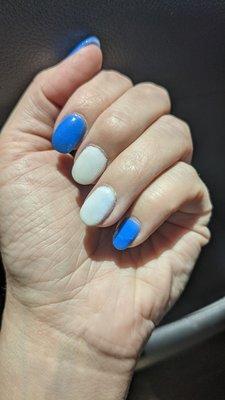 Cracked dip manicure after 1 day, and blue powder mixed in with white accent nails