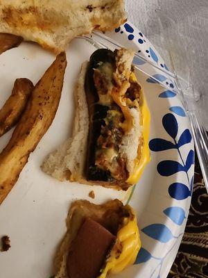 Went to this place today, I got the chili cheese dog basket when I got home. This mess looked and tasted the same burnt.