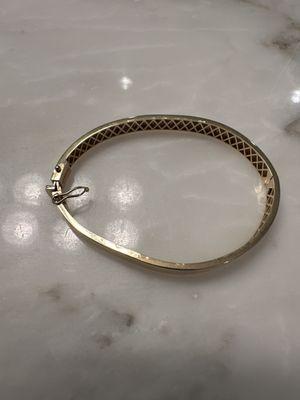 Current shape of bangle. Totally misshapen.