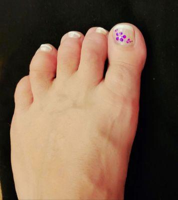 Loving my hand painted flower during my pedi at Gorgeous nails and spa. Thank you, Rose