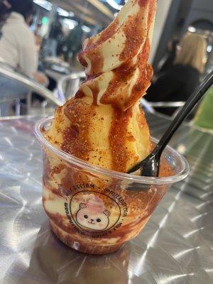 Mango with pineapple dole whip ice cream with chamoy and tajin