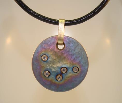 Titanium pendant. Lunar inspired with Diamonds. Only available at Porter Jensen Jewelers