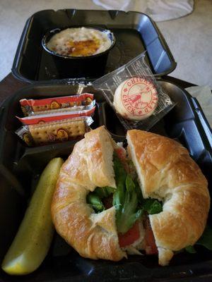 Loaded potato soup, plain chicken salad sandwich meal