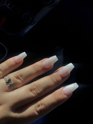 Coffin , shiny white nails .