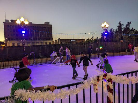 Ice skating is not just for winter! Rent our Synthetic Ice Skating Rink all year long for a family-friendly fun time! www.EmeraldEvents.com