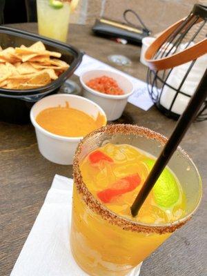 Queso, chips, salsa, mango habanero margarita