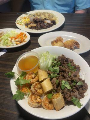 C4 filet minion with fried rice in background and v7 combination vermicelli (bun) in front