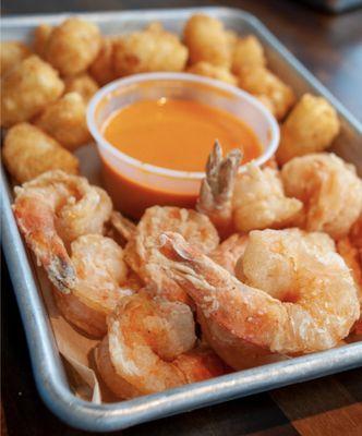 Our Shrimps with sauce on the side and tater tots