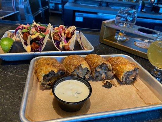 Pork belly Korean bbq tacos and mushroom and Brie egg rolls