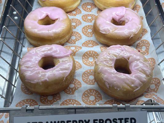 Donuts iced by toddlers