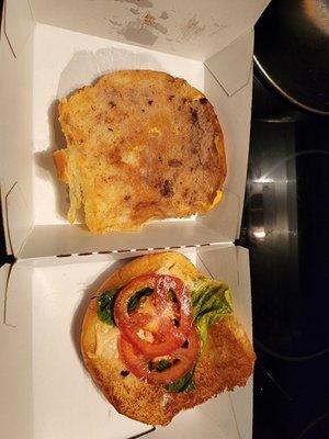 The potato bun of my cheese burger and the tomatoes and lettuce pn in!