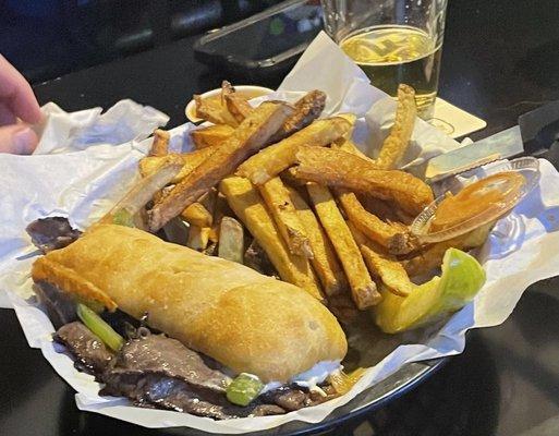 Philly cheesesteak and fries