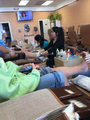 Busy nail salon new pedicure chairs! Professional staff clean and friendly!