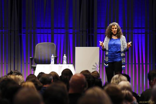 Dr. Julie Gottman presenting in Reykjavik, Iceland.