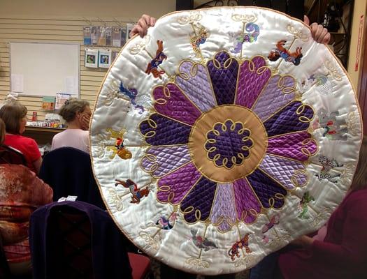 Sew What's New? A beautiful Carousel Round Blankets made for one of our club member's new baby twin granddaughters.