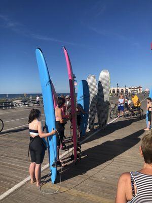 Wet suit & board included in cost of lesson.