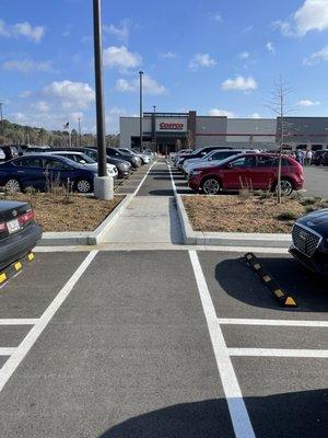 Costco is so thoughtful they have a cart path between parking spots.