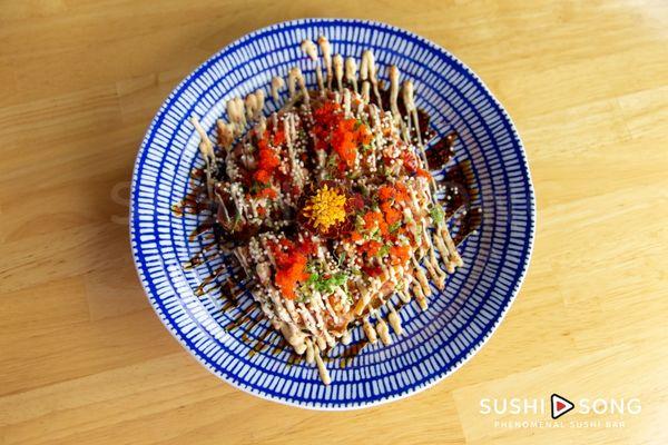 Japanese Pizza - Tortilla topped with Spicy Tuna Tartar, Tomato, Cilantro, Red Onion, Spicy Mayo & House Special Sauce