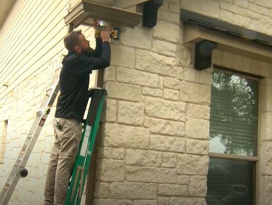 Matt installing cameras during our CBS Austin news interview