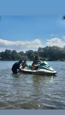 Showing you how to balance while entering and jetski in the water