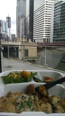 Nice view of the river despite the weather. Daily hot bar=good pecan-crusted chicken.