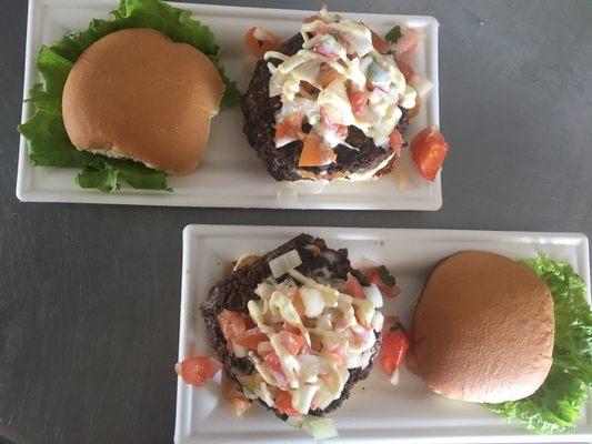 Lentil burgers with pico de gallo, cheddar, lime crema and aioli